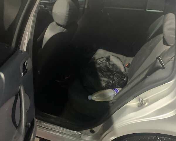 Серый Шкода Октавия, объемом двигателя 1.6 л и пробегом 305 тыс. км за 4500 $, фото 3 на Automoto.ua