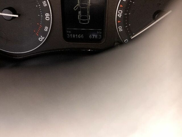 Сірий Шкода Октавія, об'ємом двигуна 2 л та пробігом 318 тис. км за 5201 $, фото 9 на Automoto.ua