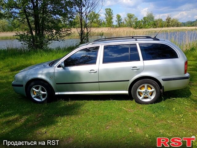 Серый Шкода Октавия, объемом двигателя 1.6 л и пробегом 241 тыс. км за 5400 $, фото 1 на Automoto.ua