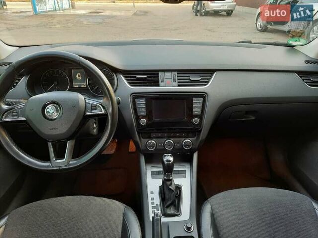 Шкода Октавия 2013 в Первомайск на Automoto.ua Серый Шкода Октавия, объемом двигателя 1.6 л и пробегом 220 тыс. км за 11800 $, фото 9 на Automoto.ua