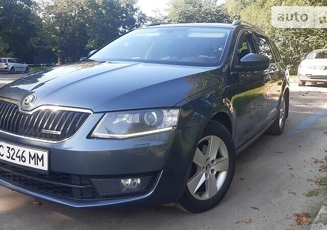Шкода Октавия 2014 в Львове на Automoto.ua Серый Шкода Октавия, объемом двигателя 1.6 л и пробегом 294 тыс. км за 11499 $, фото 3 на Automoto.ua