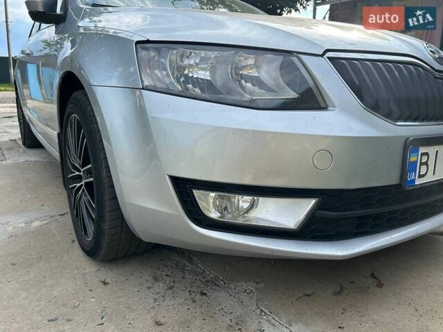 Шкода Октавия 2014 в Полтаве на Automoto.ua Серый Шкода Октавия, объемом двигателя 1.6 л и пробегом 280 тыс. км за 11190 $, фото 12 на Automoto.ua