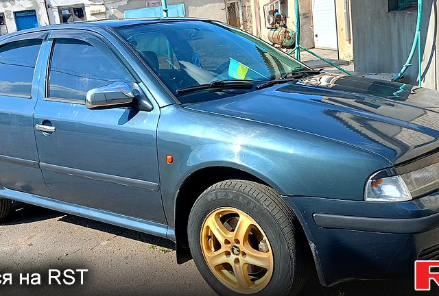 Серый Шкода Октавия, объемом двигателя 1.9 л и пробегом 350 тыс. км за 3500 $, фото 2 на Automoto.ua