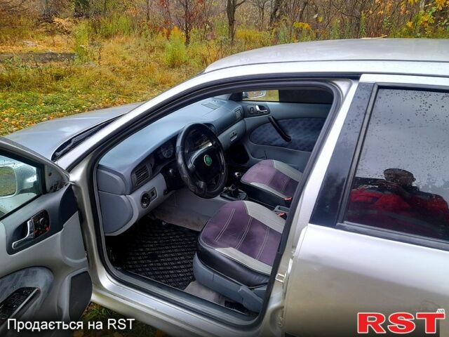 Серый Шкода Октавия, объемом двигателя 1.6 л и пробегом 324 тыс. км за 2999 $, фото 4 на Automoto.ua