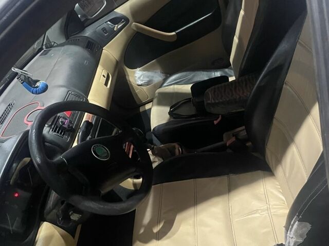 Серый Шкода Октавия, объемом двигателя 1.8 л и пробегом 387 тыс. км за 3600 $, фото 5 на Automoto.ua