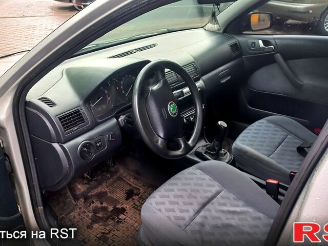 Серый Шкода Октавия, объемом двигателя 1.6 л и пробегом 255 тыс. км за 4500 $, фото 5 на Automoto.ua