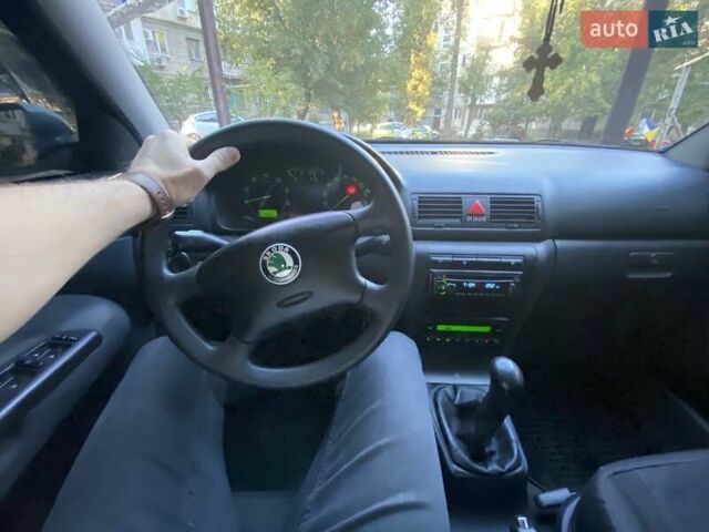 Серый Шкода Октавия, объемом двигателя 1.8 л и пробегом 248 тыс. км за 5600 $, фото 6 на Automoto.ua