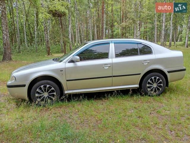 Серый Шкода Октавия, объемом двигателя 2 л и пробегом 300 тыс. км за 4500 $, фото 2 на Automoto.ua