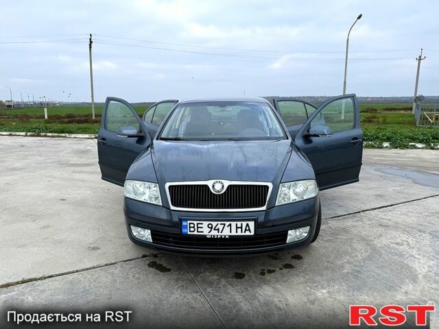 Серый Шкода Октавия, объемом двигателя 1.6 л и пробегом 206 тыс. км за 5600 $, фото 3 на Automoto.ua