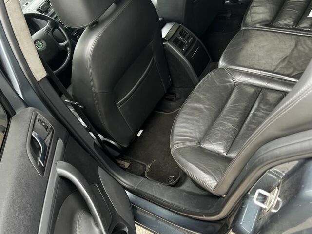 Сірий Шкода Октавія, об'ємом двигуна 2 л та пробігом 400 тис. км за 4900 $, фото 5 на Automoto.ua