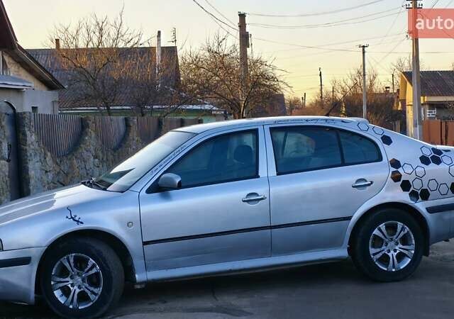 Серый Шкода Октавия, объемом двигателя 1.6 л и пробегом 406 тыс. км за 3111 $, фото 2 на Automoto.ua