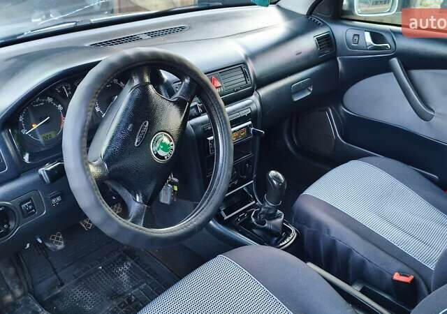 Серый Шкода Октавия, объемом двигателя 1.6 л и пробегом 406 тыс. км за 3111 $, фото 14 на Automoto.ua