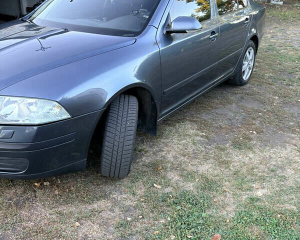 Серый Шкода Октавия, объемом двигателя 1.6 л и пробегом 230 тыс. км за 7200 $, фото 1 на Automoto.ua