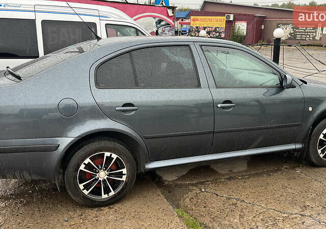 Серый Шкода Октавия, объемом двигателя 1.6 л и пробегом 232 тыс. км за 6500 $, фото 2 на Automoto.ua