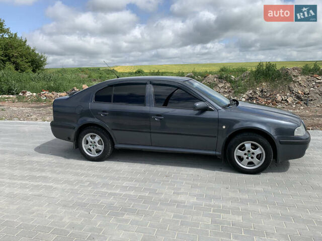 Серый Шкода Октавия, объемом двигателя 1.6 л и пробегом 242 тыс. км за 5400 $, фото 1 на Automoto.ua