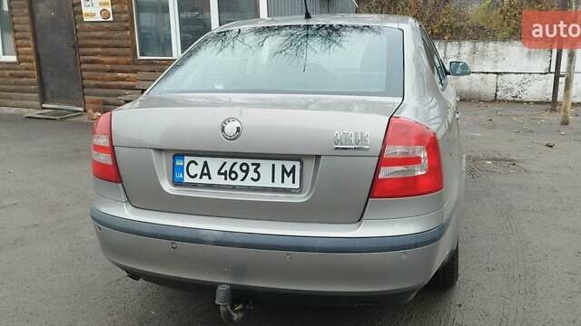 Серый Шкода Октавия, объемом двигателя 1.6 л и пробегом 297 тыс. км за 5400 $, фото 7 на Automoto.ua