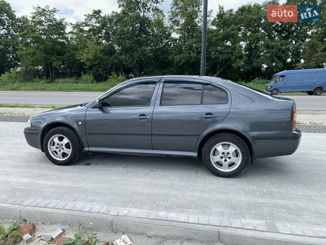 Серый Шкода Октавия, объемом двигателя 1.6 л и пробегом 242 тыс. км за 5400 $, фото 3 на Automoto.ua