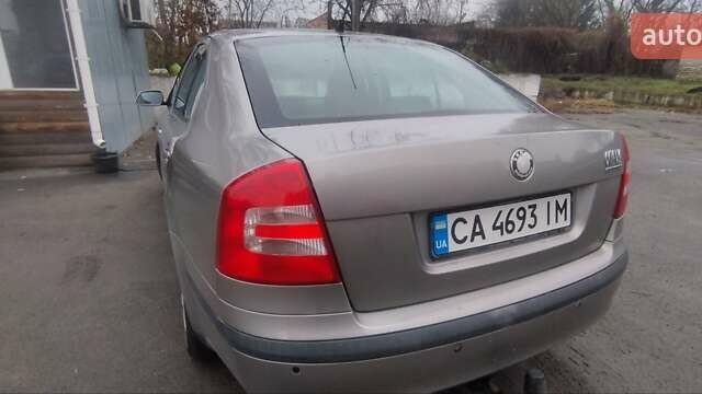 Серый Шкода Октавия, объемом двигателя 1.6 л и пробегом 297 тыс. км за 5400 $, фото 8 на Automoto.ua