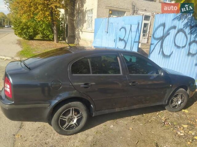 Серый Шкода Октавия, объемом двигателя 1.6 л и пробегом 235 тыс. км за 4200 $, фото 7 на Automoto.ua