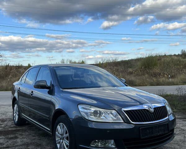 Серый Шкода Октавия, объемом двигателя 1.6 л и пробегом 227 тыс. км за 7950 $, фото 1 на Automoto.ua