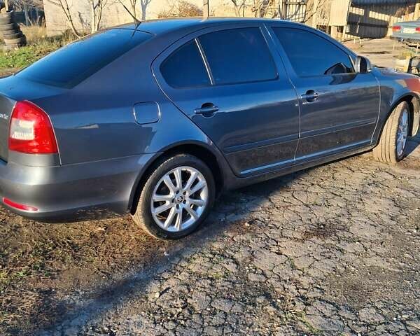 Серый Шкода Октавия, объемом двигателя 1.8 л и пробегом 162 тыс. км за 10800 $, фото 3 на Automoto.ua