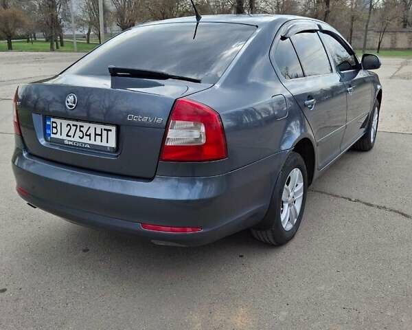 Серый Шкода Октавия, объемом двигателя 1.6 л и пробегом 142 тыс. км за 8300 $, фото 4 на Automoto.ua