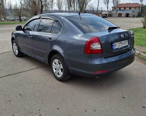 Серый Шкода Октавия, объемом двигателя 1.6 л и пробегом 142 тыс. км за 8300 $, фото 2 на Automoto.ua
