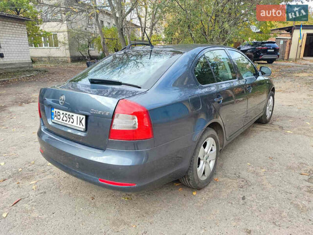 Шкода Октавія 2011 у Тульчине на Automoto.ua Сірий Шкода Октавія, об'ємом двигуна 1.2 л та пробігом 186 тис. км за 6800 $, фото 5 на Automoto.ua