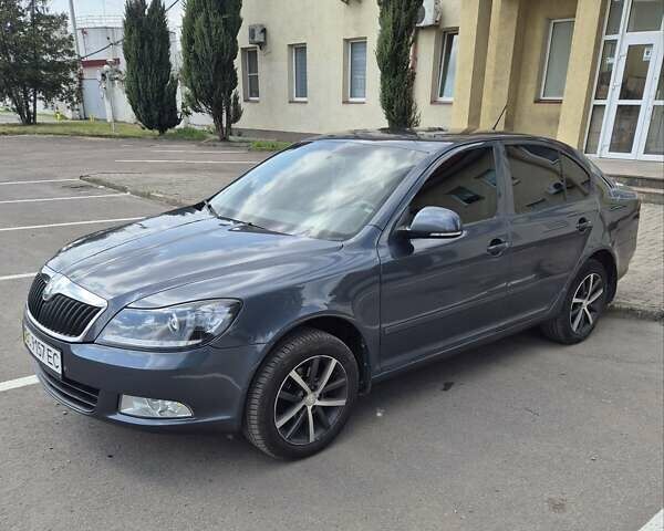 Серый Шкода Октавия, объемом двигателя 1.6 л и пробегом 133 тыс. км за 8999 $, фото 1 на Automoto.ua