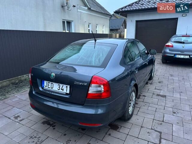 Сірий Шкода Октавія, об'ємом двигуна 2 л та пробігом 244 тис. км за 9400 $, фото 5 на Automoto.ua
