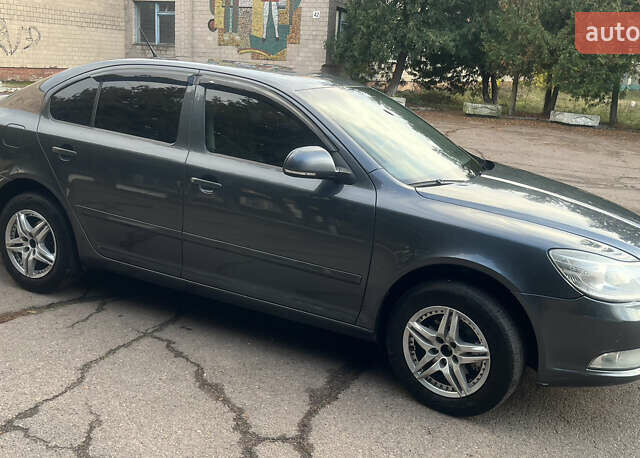 Шкода Октавія 2012 у Нежине на Automoto.ua Сірий Шкода Октавія, об'ємом двигуна 1.6 л та пробігом 215 тис. км за 8700 $, фото 2 на Automoto.ua