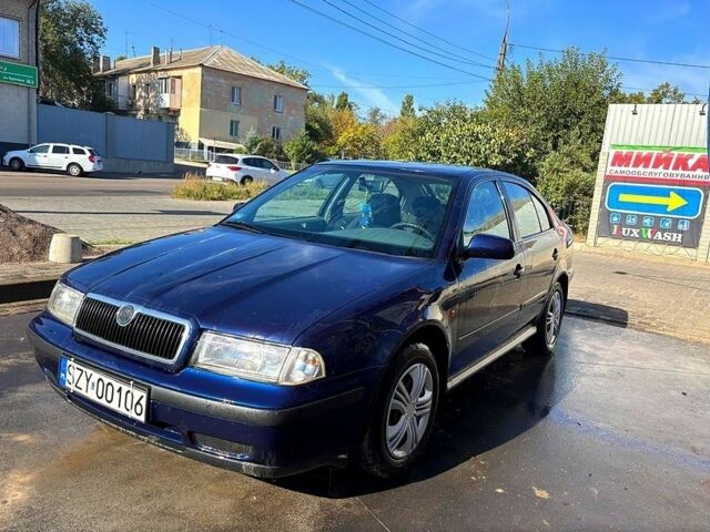 Синий Шкода Октавия, объемом двигателя 1.6 л и пробегом 289 тыс. км за 2100 $, фото 2 на Automoto.ua