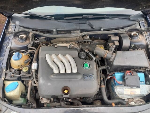 Синий Шкода Октавия, объемом двигателя 2 л и пробегом 245 тыс. км за 3562 $, фото 2 на Automoto.ua