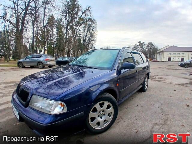 Синий Шкода Октавия, объемом двигателя 1.6 л и пробегом 209 тыс. км за 3850 $, фото 2 на Automoto.ua