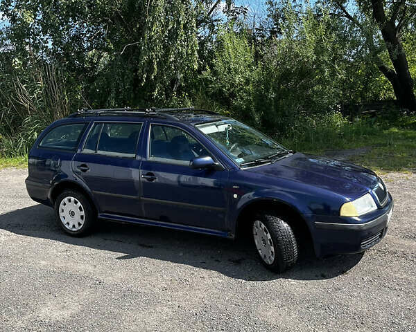 Синий Шкода Октавия, объемом двигателя 1.98 л и пробегом 241 тыс. км за 2900 $, фото 4 на Automoto.ua