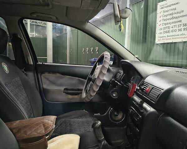 Синий Шкода Октавия, объемом двигателя 1.6 л и пробегом 330 тыс. км за 4500 $, фото 8 на Automoto.ua