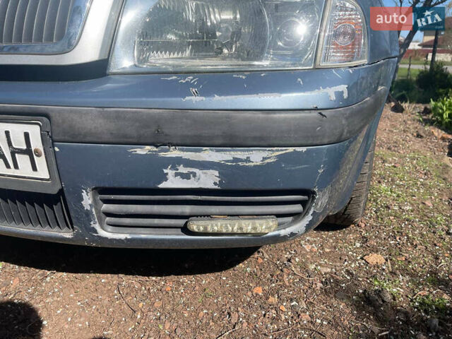Синий Шкода Октавия, объемом двигателя 1.8 л и пробегом 342 тыс. км за 5000 $, фото 11 на Automoto.ua