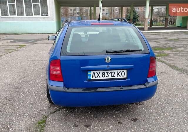 Синий Шкода Октавия, объемом двигателя 1.6 л и пробегом 345 тыс. км за 4900 $, фото 5 на Automoto.ua