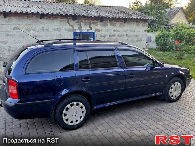Синий Шкода Октавия, объемом двигателя 1.6 л и пробегом 260 тыс. км за 4850 $, фото 6 на Automoto.ua