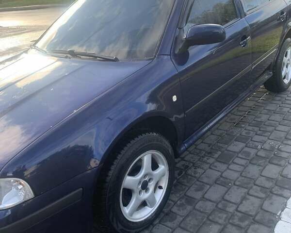 Синий Шкода Октавия, объемом двигателя 2 л и пробегом 229 тыс. км за 4600 $, фото 1 на Automoto.ua