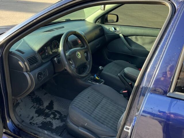 Синий Шкода Октавия, объемом двигателя 1.6 л и пробегом 380 тыс. км за 3800 $, фото 7 на Automoto.ua