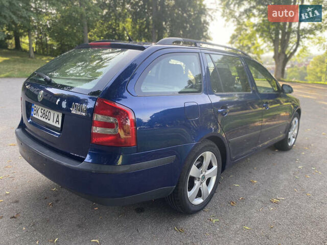 Синій Шкода Октавія, об'ємом двигуна 2 л та пробігом 242 тис. км за 7999 $, фото 31 на Automoto.ua