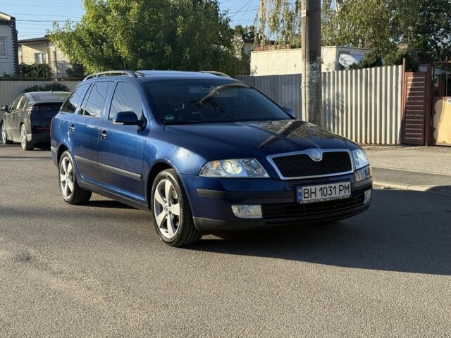 Синий Шкода Октавия, объемом двигателя 2 л и пробегом 234 тыс. км за 5700 $, фото 2 на Automoto.ua