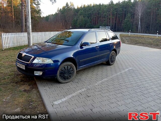 Синий Шкода Октавия, объемом двигателя 2 л и пробегом 231 тыс. км за 5499 $, фото 1 на Automoto.ua