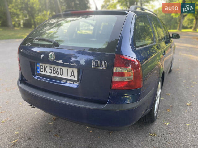 Синій Шкода Октавія, об'ємом двигуна 2 л та пробігом 242 тис. км за 7999 $, фото 34 на Automoto.ua