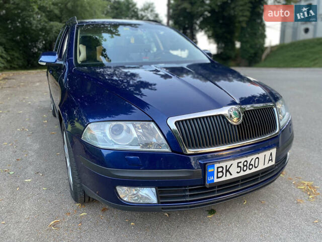 Синій Шкода Октавія, об'ємом двигуна 2 л та пробігом 242 тис. км за 7999 $, фото 2 на Automoto.ua