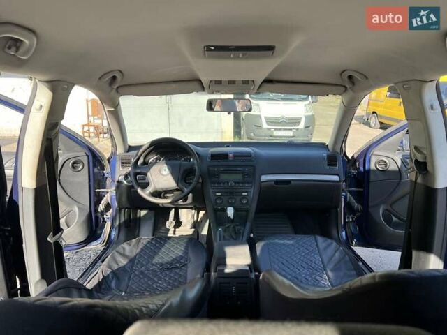 Синий Шкода Октавия, объемом двигателя 1.6 л и пробегом 254 тыс. км за 5800 $, фото 19 на Automoto.ua