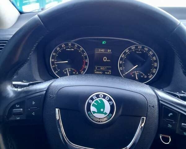 Синий Шкода Октавия, объемом двигателя 1.6 л и пробегом 317 тыс. км за 7777 $, фото 13 на Automoto.ua