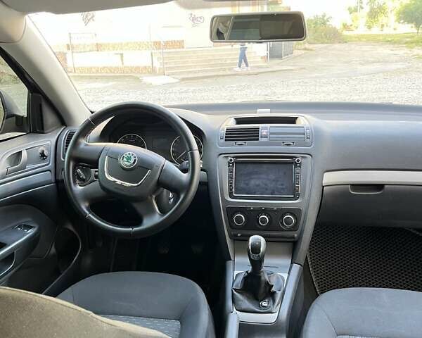 Синий Шкода Октавия, объемом двигателя 1.6 л и пробегом 231 тыс. км за 7800 $, фото 12 на Automoto.ua