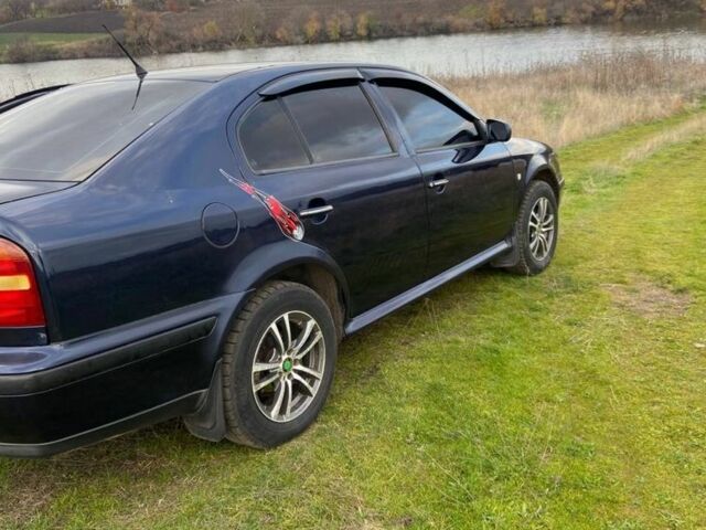 Синий Шкода Октавия, объемом двигателя 1.8 л и пробегом 200 тыс. км за 3500 $, фото 2 на Automoto.ua